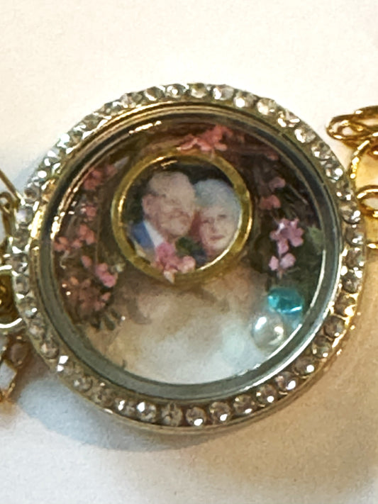 Locket with photo and flowers