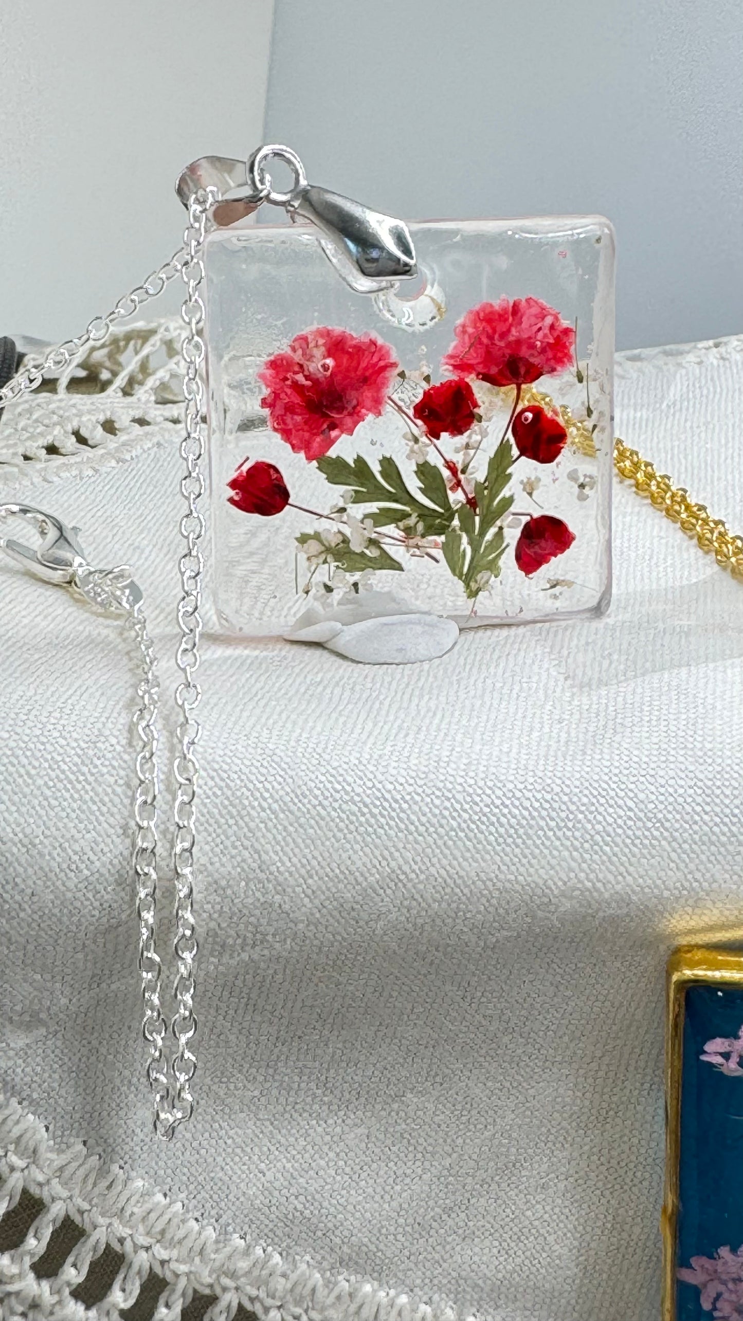 Clear Pendant with Bright Red Babys Breath