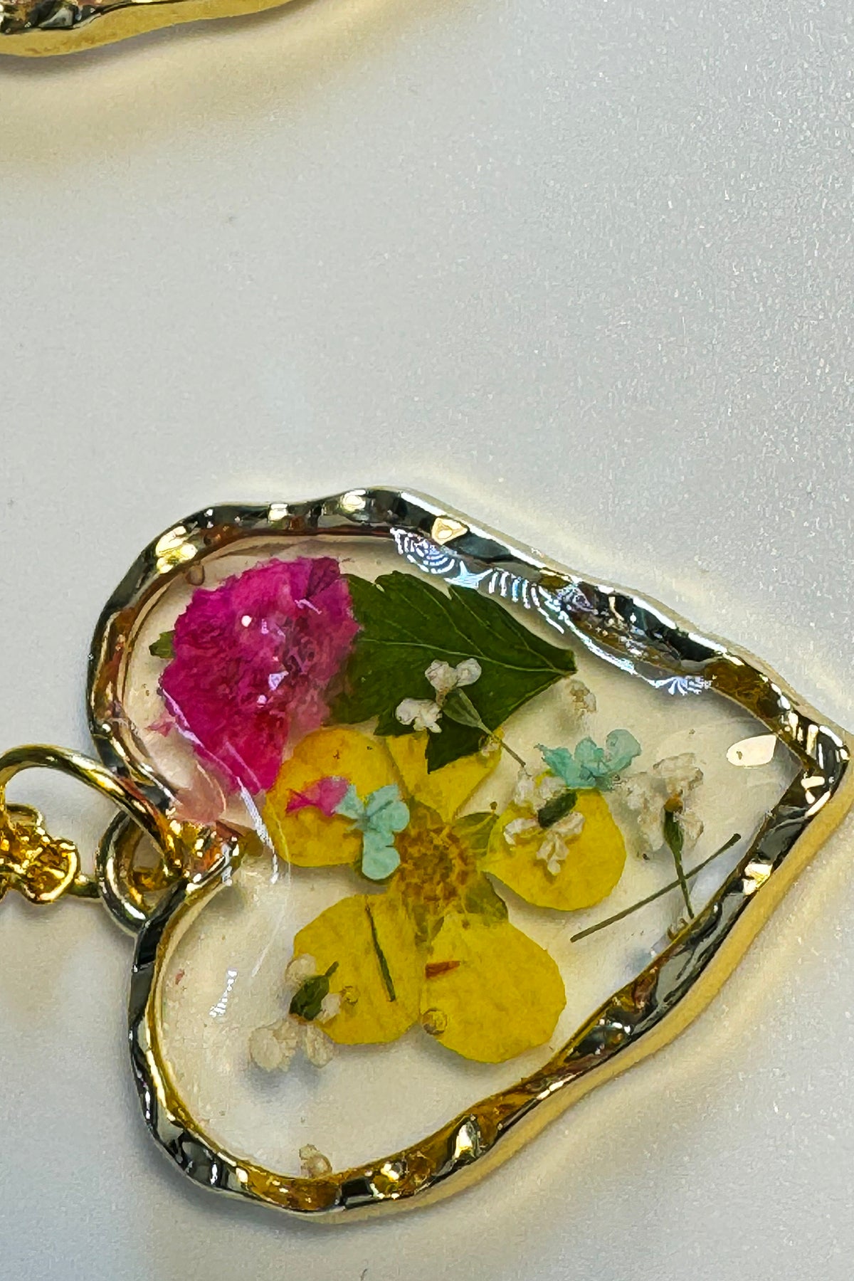 Flower filled Heart Pendant with clear background
