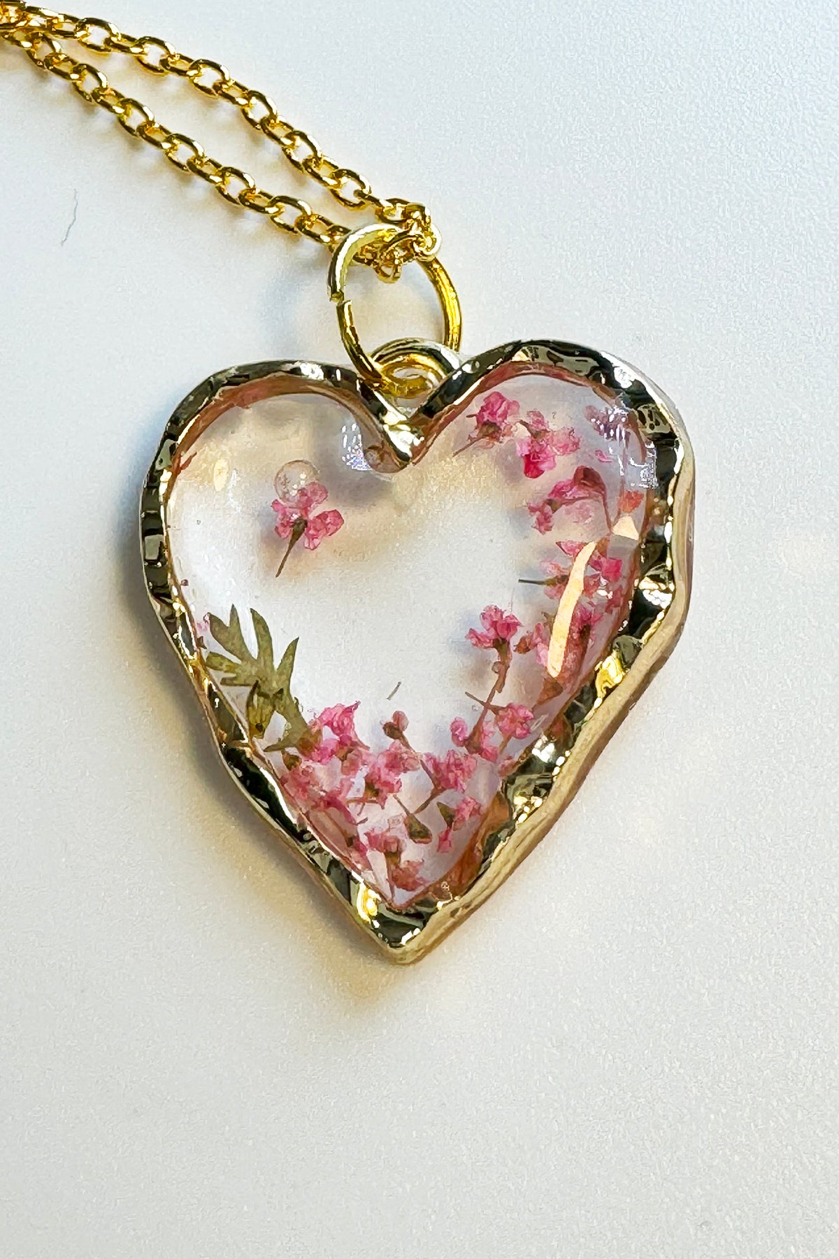 Dainty Pink Flowers in Heart Pendant. Everyones favorite.