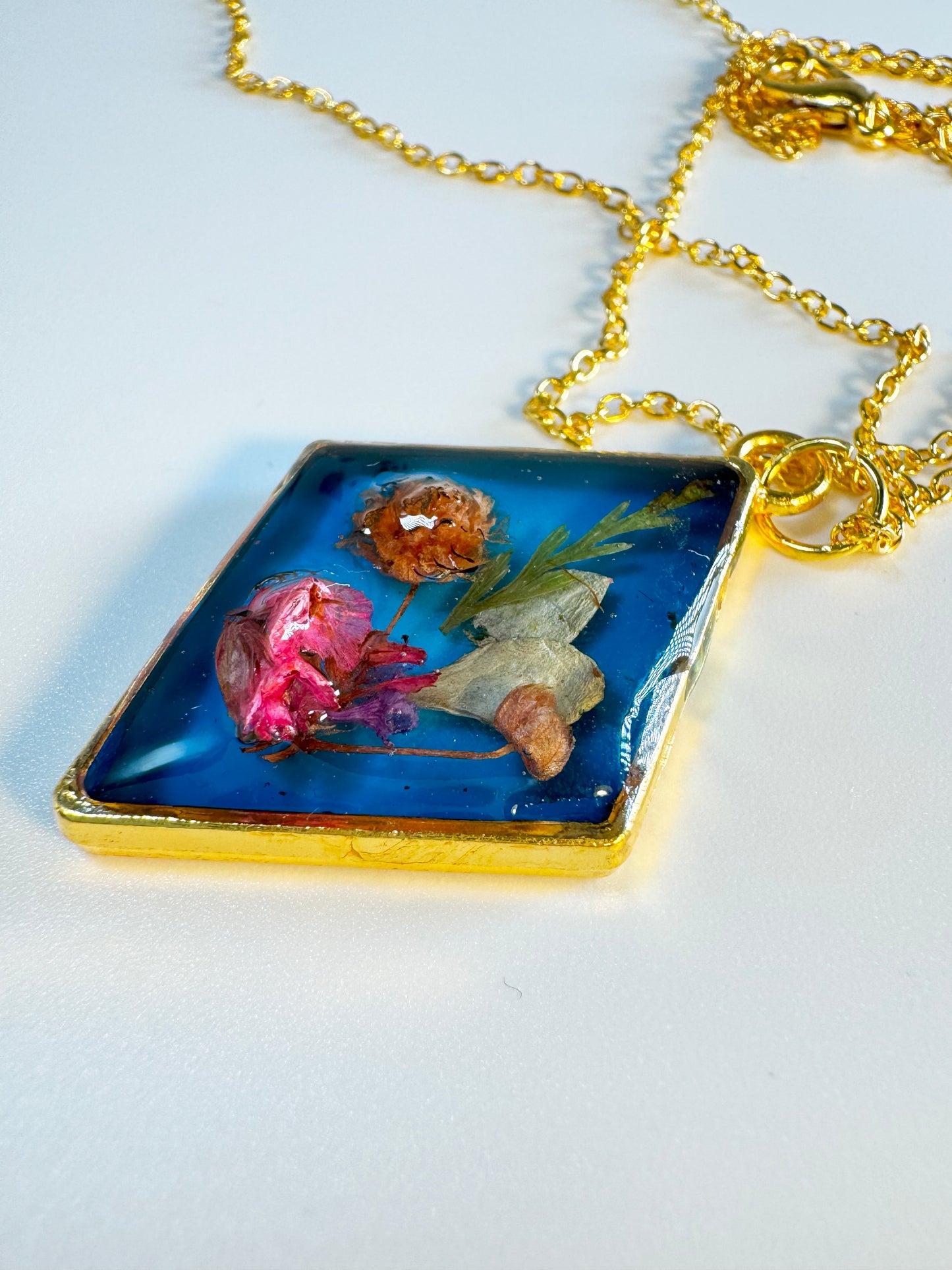 Blue Pendant with Red Rose