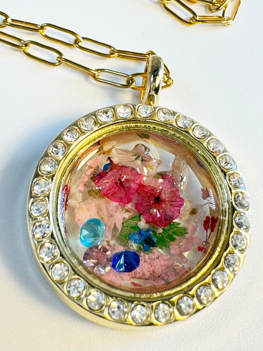Gold Locket with Flowers and colored gems.  Can be custom ordered with birth stones.