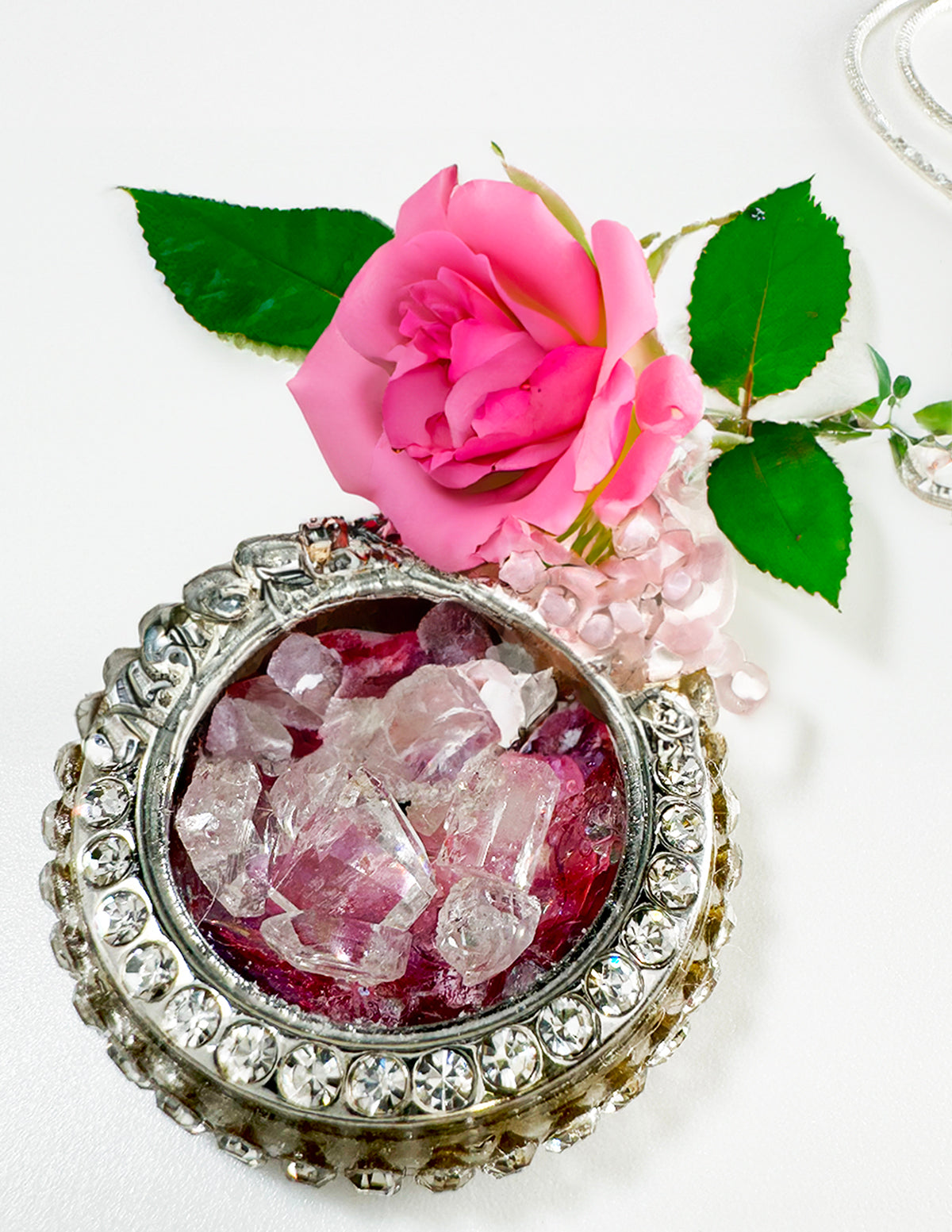 Locket with Red Flower Background and Sparkling Gemstones