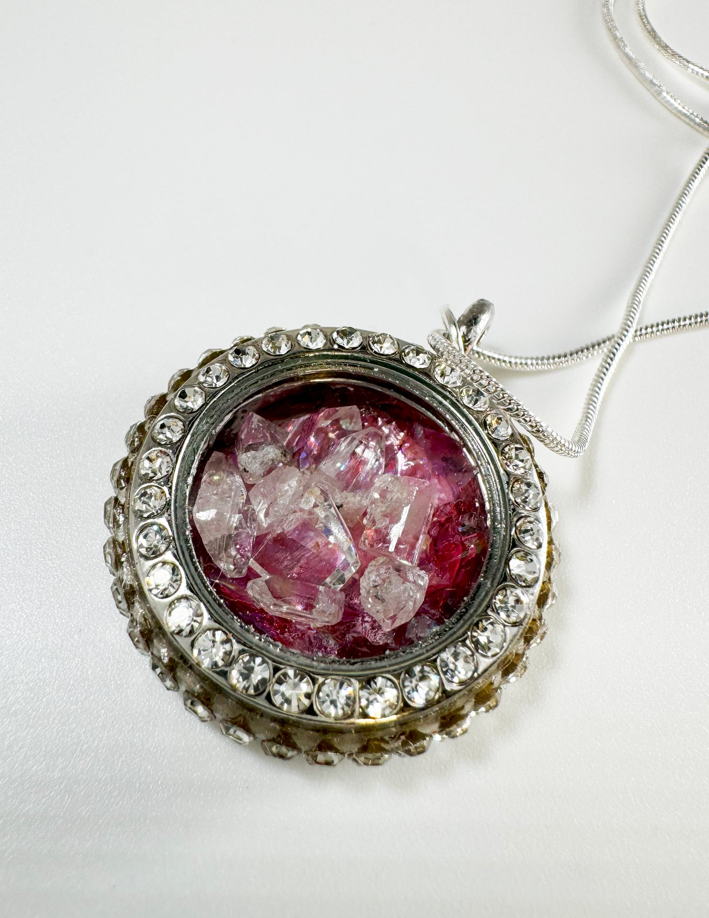 Locket with Red Flower Background and Sparkling Gemstones