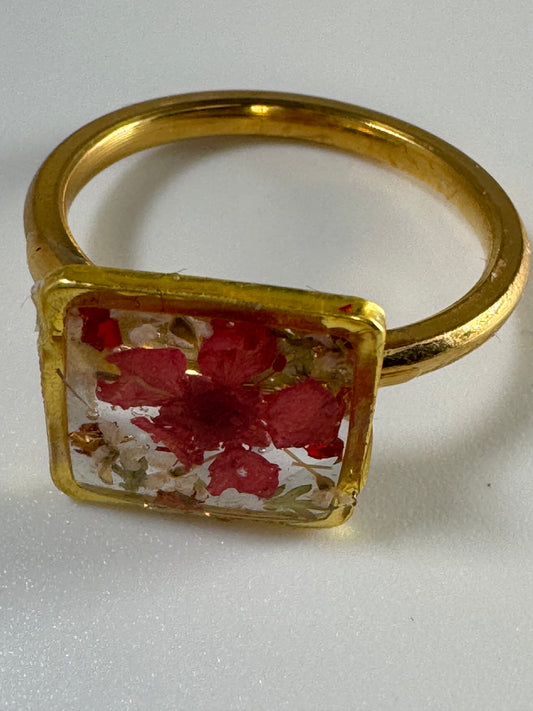 Square Flower Ring with Red Flowers and gold ring.