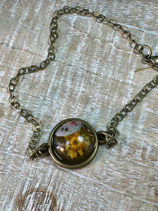 Unique Black Bracelet with golden flowers.