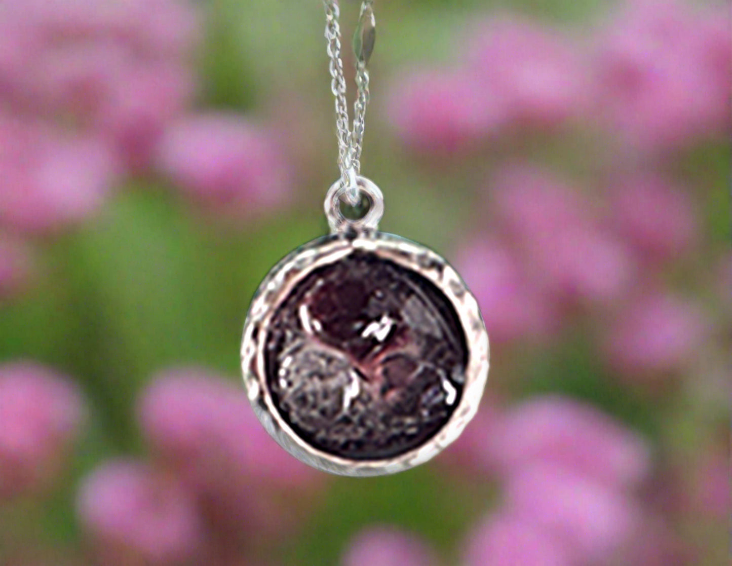 Black Pendant with Hammered Silver Setting and Purple Charm