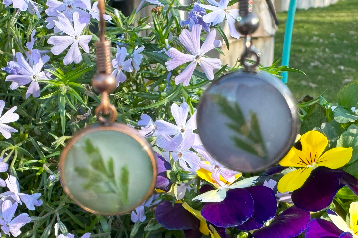 Earrings   Simple Green Fern against a white background in antique bronze