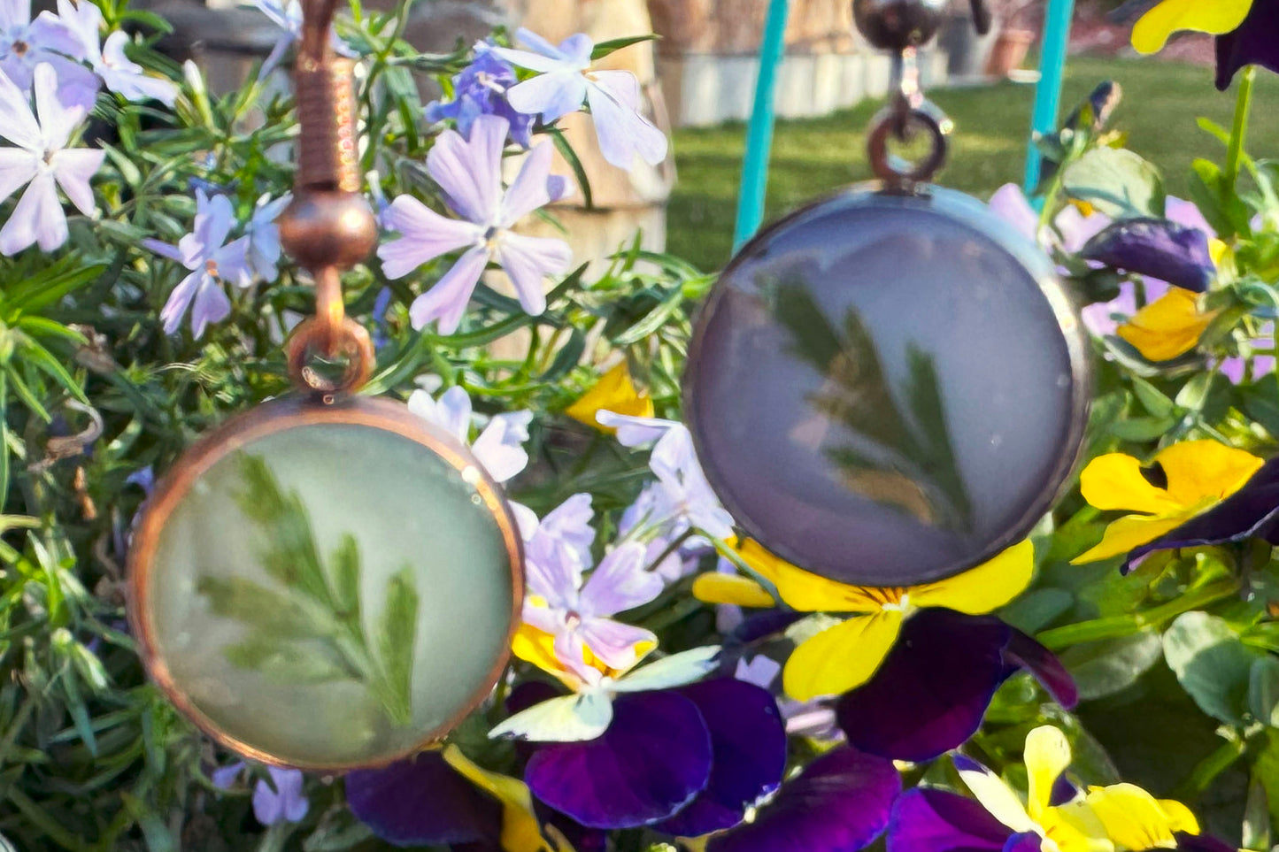 Earrings   Simple Green Fern against a white background in antique bronze