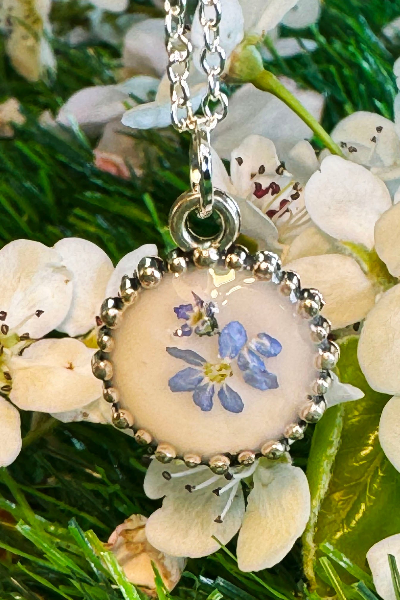 Tiny Pendant with White Background and Blue "Forget Me Not"