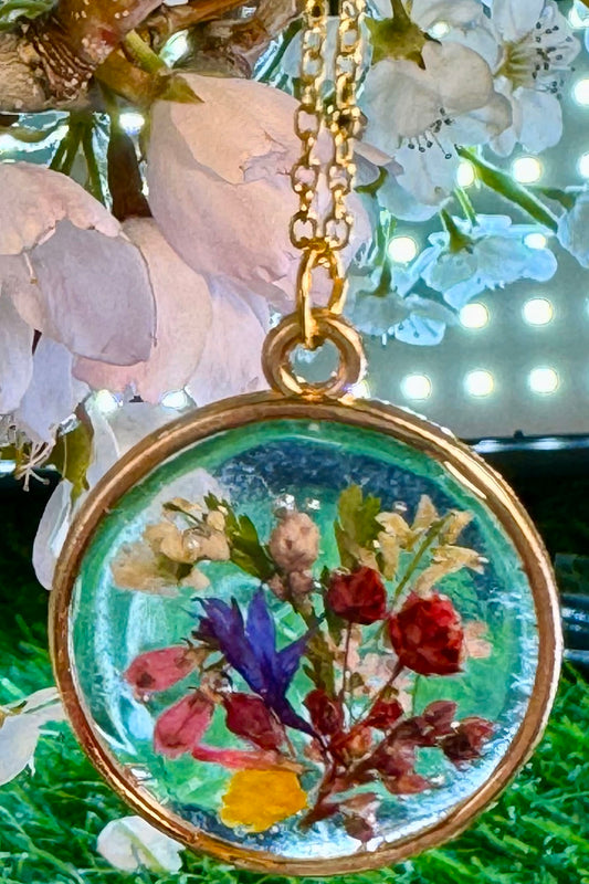 Colorful Flowers in a Round Pendant