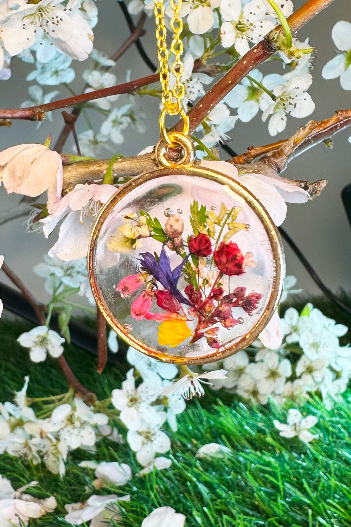Colorful Flowers in a Round Pendant