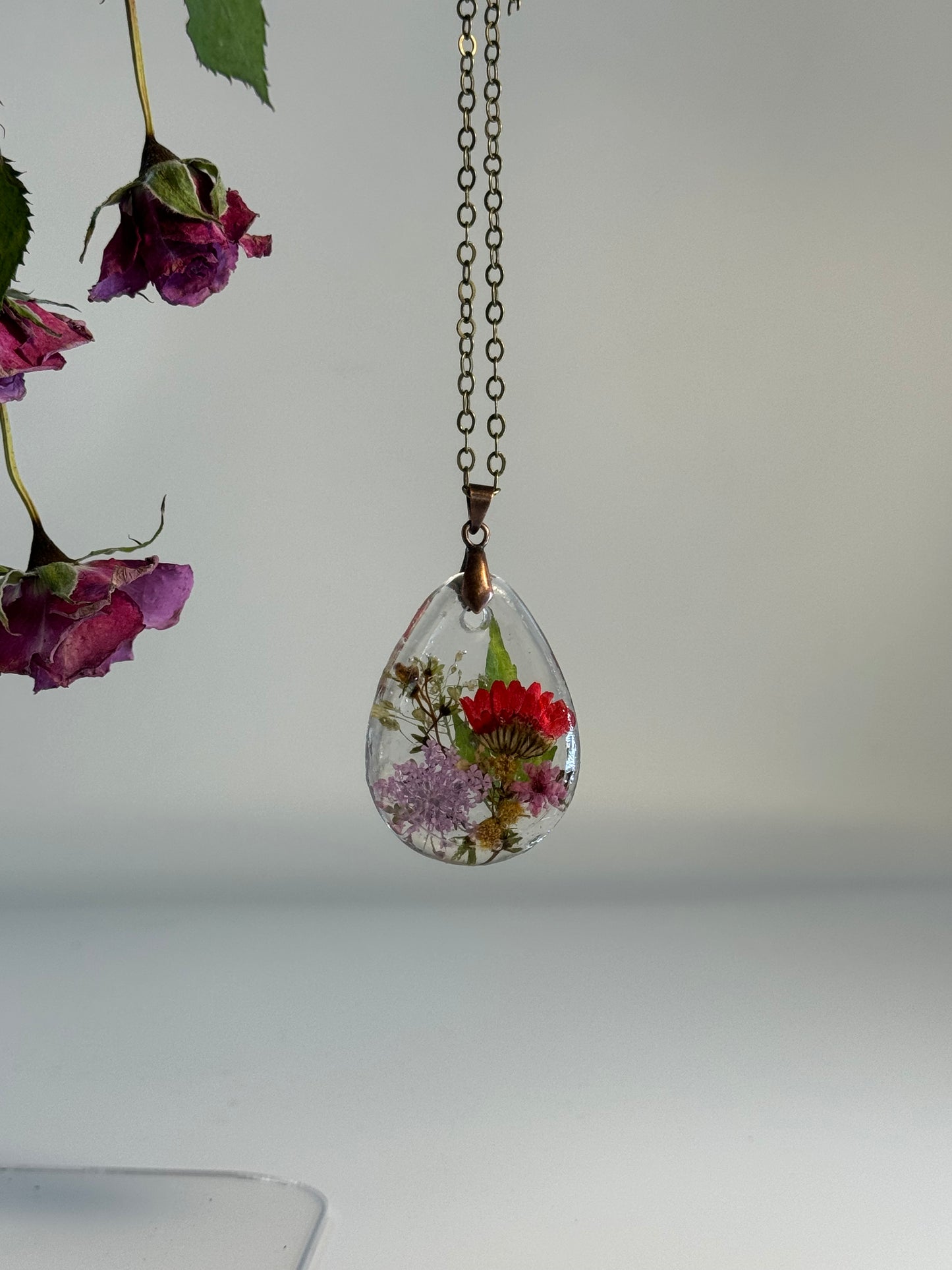 Teardrop Pendant with colored Flowers